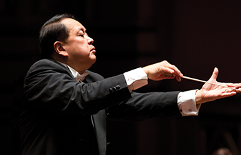 Ling Conducts Brahms Concert Image